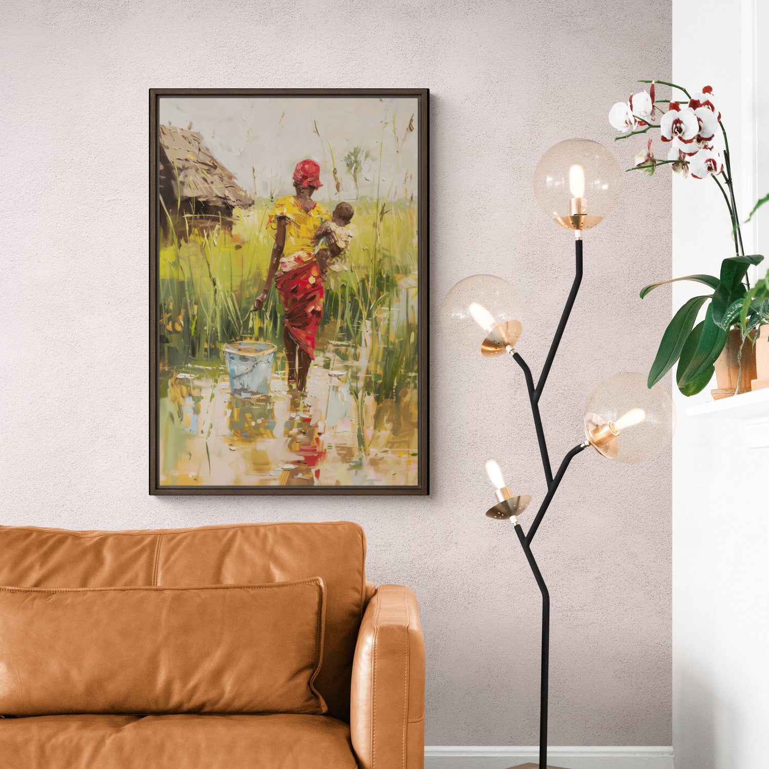 African mother and child village canvas print styled in modern living room. Black Motherhood Art in earthy warm tones.